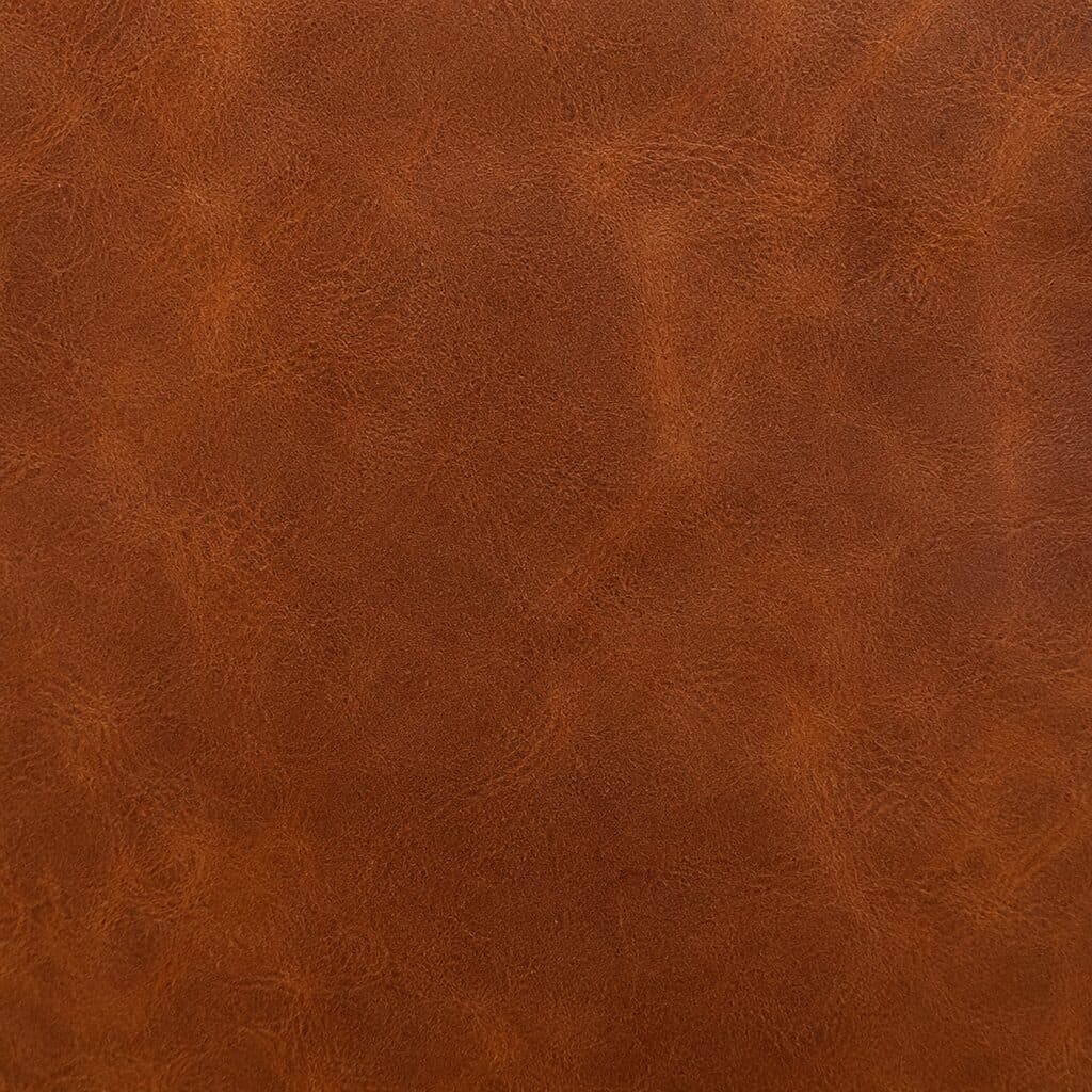 Cuero graso GF Group — pátina marmoleada con tratamiento de aceites, color cognac profundo, ideal para maletines de uso diario